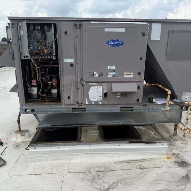 Carrier rooftop package unit with its access panels open