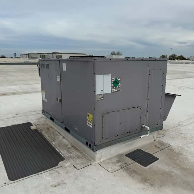 Clean rooftop package unit on a commercial roof